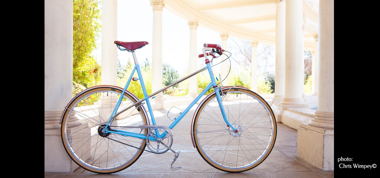 Chris Wimpey photo of this Biship Mixte frameset in chrome and sky blue.